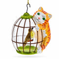 Cat and Caged Bird Glass Christmas Ornament